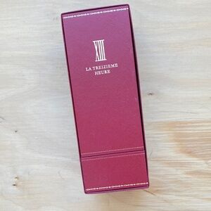 Cartier Red Perfume Box with White Text